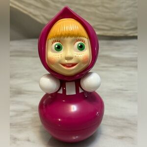 This is a Masha and the Bear roly-poly toy, also known as a Nevalyashka